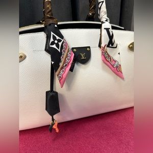 Authentic white Louis Vuitton bag with dust bag and box included.